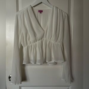 Francesca’s white blouse